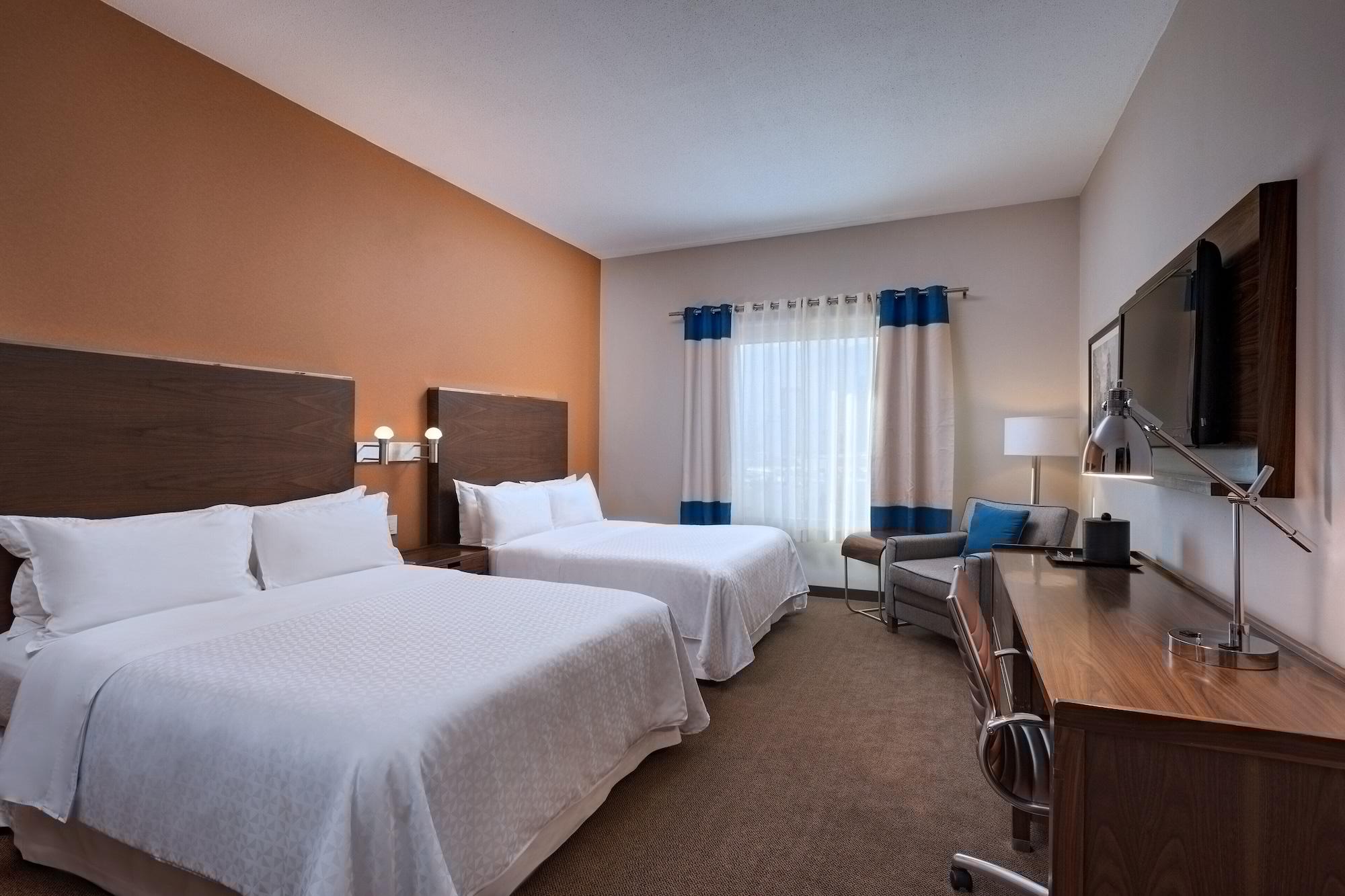 Four Points By Sheraton Galerias Monterrey Exterior foto A typical guest room at an extended stay hotel
